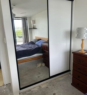 Mirror And Vinyl Robe With Black Frame